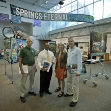 The Springs Eternal Project's first exhibition tour for policy makers. Dr. Bob Knight, Representative Clovis Watson, Jr., Springs Eternal Project Co-Directors Lesley Gamble and John Moran